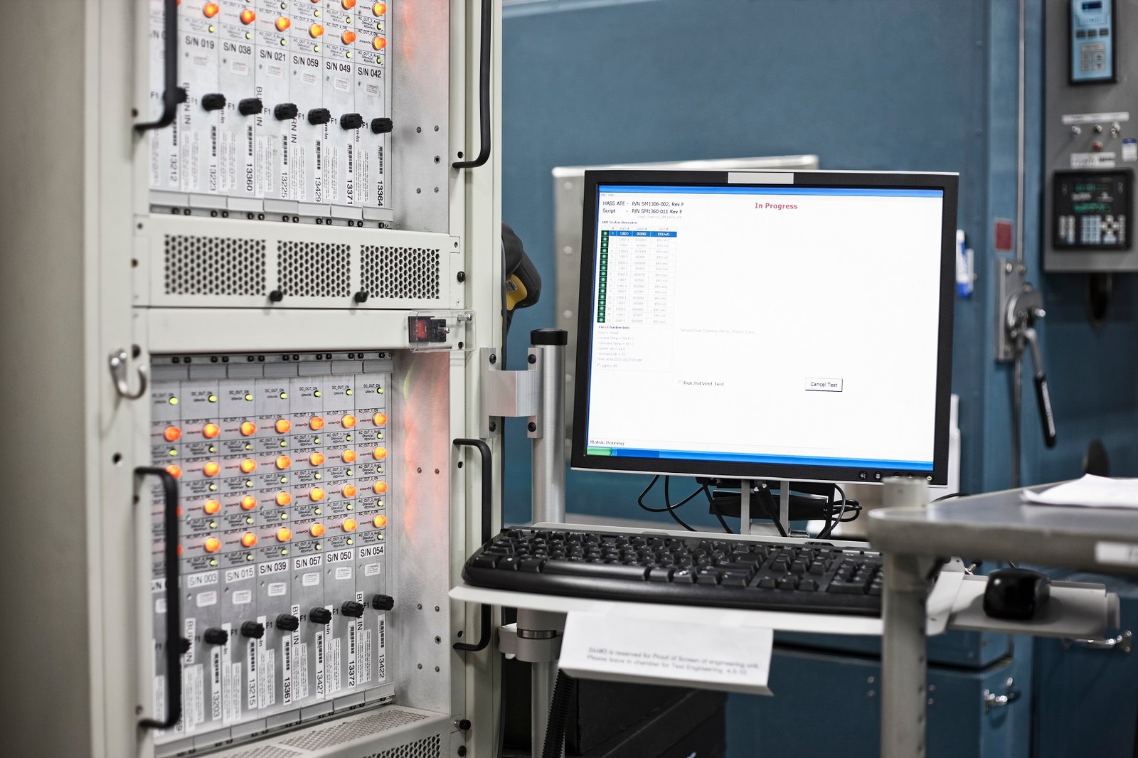 A computer screen at a work station in a reasearch and development site.